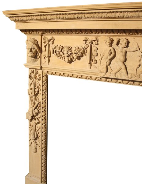 An Antique English Carved Wood Fire Surround