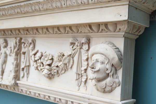 An Antique English Carved Wood Fire Surround