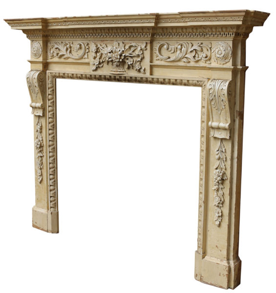 An Antique English Carved Pine Fire Surround