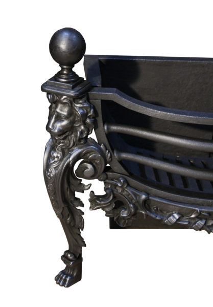A Victorian Cast Iron Fire Grate with Lion Mask Decoration
