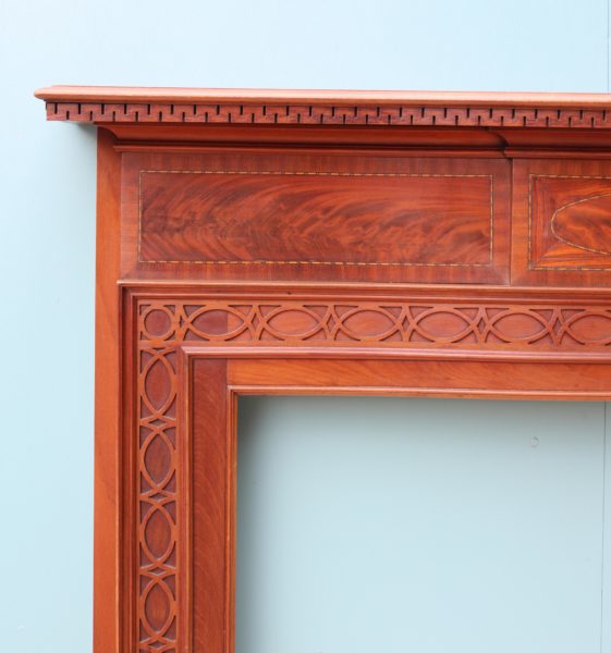 An Antique Mahogany Chippendale Style Fire Surround
