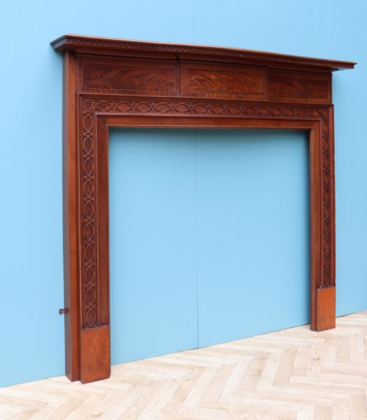 An Antique Mahogany Chippendale Style Fire Surround