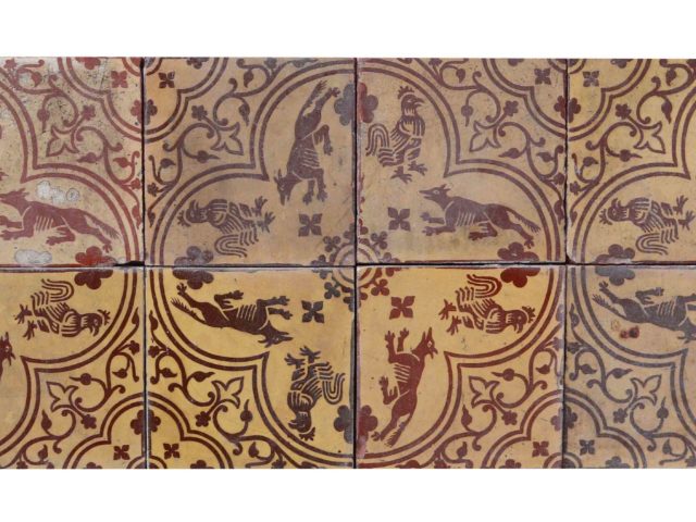 A Set of 12 Antique Medieval Style Encaustic Tiles