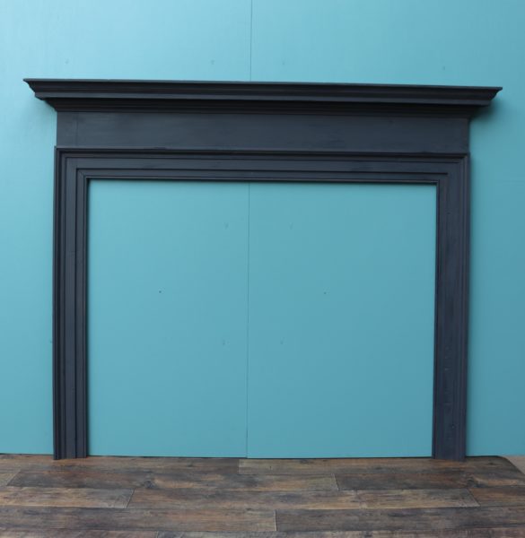 An Antique Painted Pine Fireplace