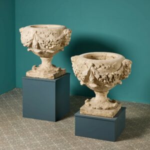 A Pair of 18th Century English Carved Limestone Urns