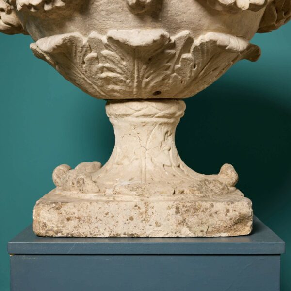 A Pair of 18th Century English Carved Limestone Urns