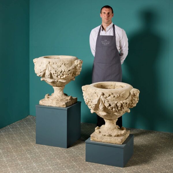 A Pair of 18th Century English Carved Limestone Urns