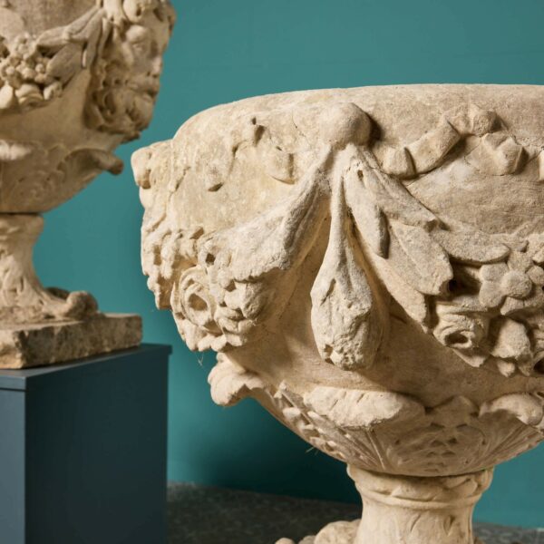 A Pair of 18th Century English Carved Limestone Urns