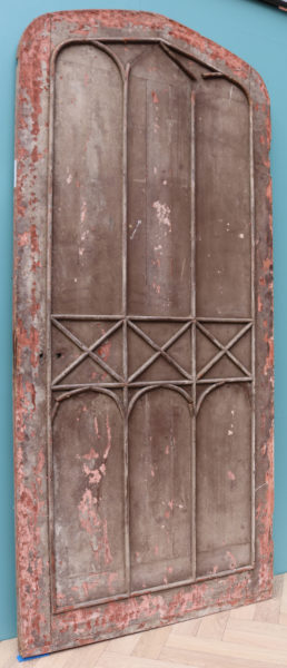 An Antique Gothic Style Arched Studded Door