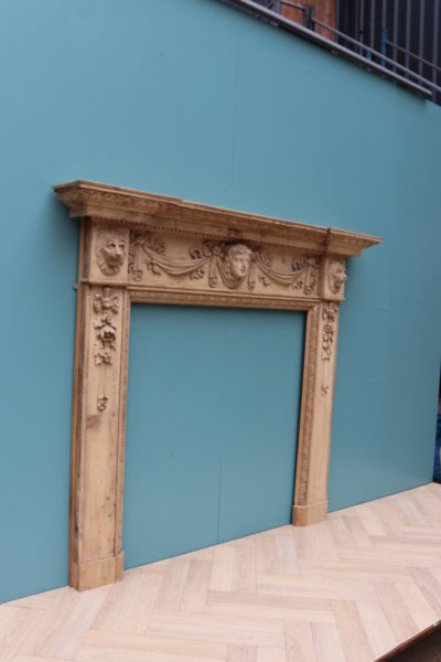 An Antique Carved Pine Fire Surround in The Style of William Kent