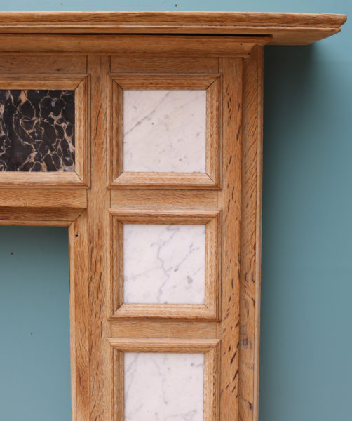 A Reclaimed Oak Fire Surround Inset with Marble Panels