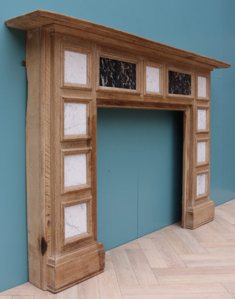 A Reclaimed Oak Fire Surround Inset with Marble Panels