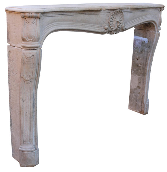 An Antique Louis XV Style Limestone Fireplace