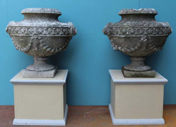 A Set of Four Reclaimed Georgian Style Lidded Stone Urn Finials