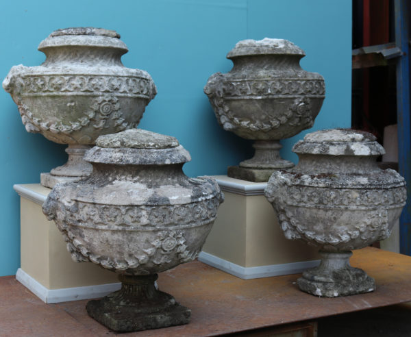 A Set of Four Reclaimed Georgian Style Lidded Stone Urn Finials