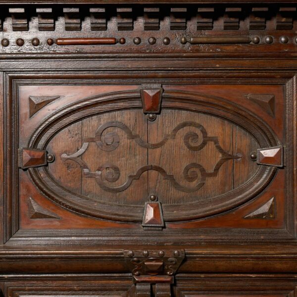 A Tall Jacobean Period Carved Oak Fireplace Surround