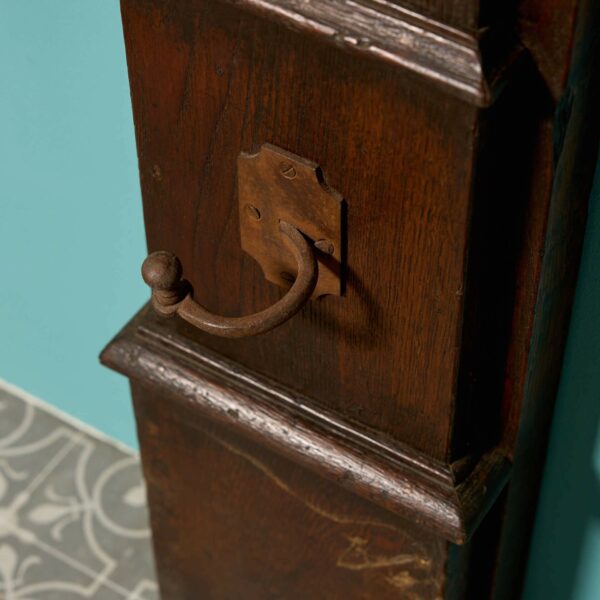 A Tall Jacobean Period Carved Oak Fireplace Surround