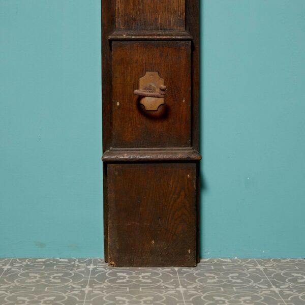 A Tall Jacobean Period Carved Oak Fireplace Surround