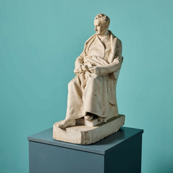 An Antique Plaster Maquette of a Seated Gentleman
