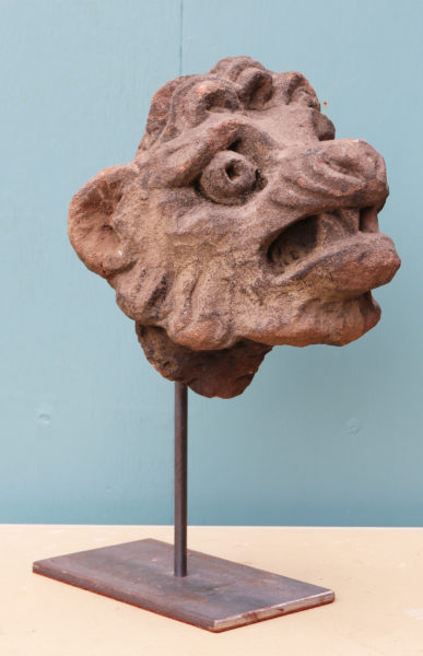 An Antique Carved Stone Lion Head Sculpture