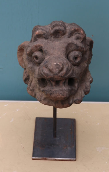 An Antique Carved Stone Lion Head Sculpture