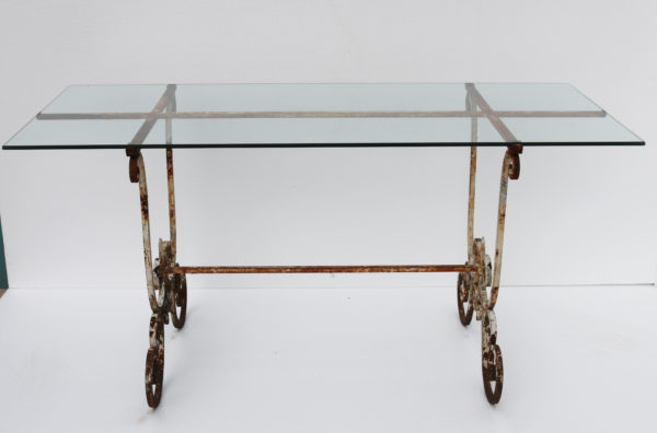 A Reclaimed Glass and Wrought Iron Garden Table
