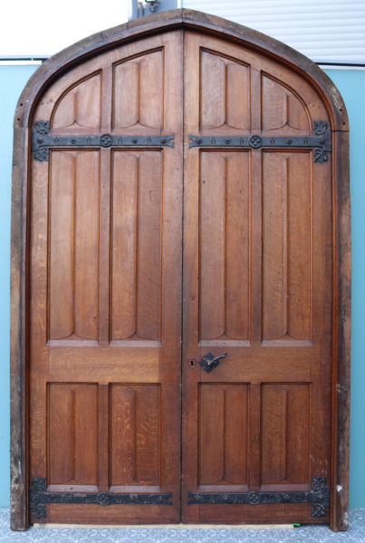 A Set of Reclaimed Arched Oak Doors with Frame