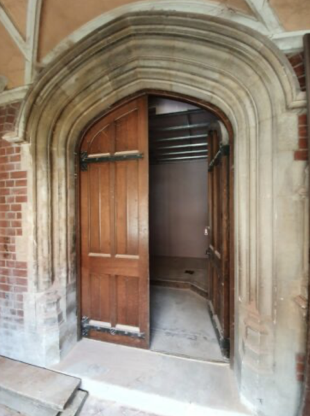 A Set of Reclaimed Arched Oak Doors with Frame