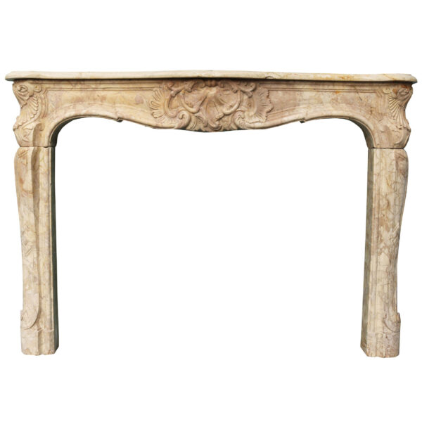 An Antique Louis XV Style Carved Sarrancolin Marble Fireplace