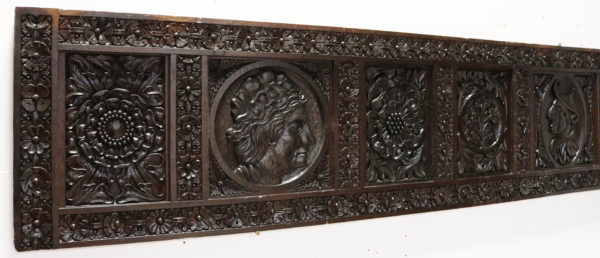 An Antique English Carved Oak Panel (2.92m wide)