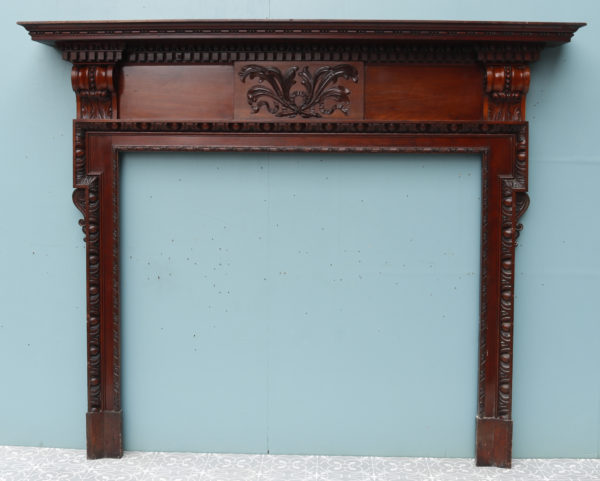 An Antique Neoclassical Style Carved Wooden Fireplace