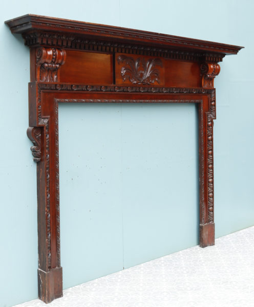 An Antique Neoclassical Style Carved Wooden Fireplace