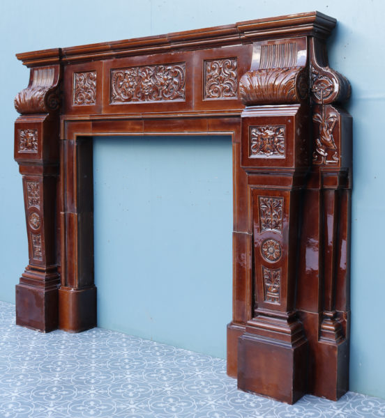 A Large Antique Royal Doulton Glazed Ceramic Fireplace