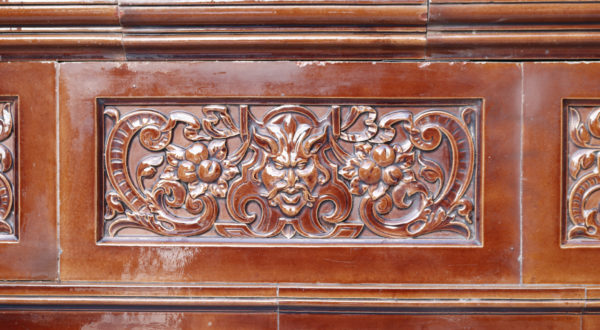 A Large Antique Royal Doulton Glazed Ceramic Fireplace