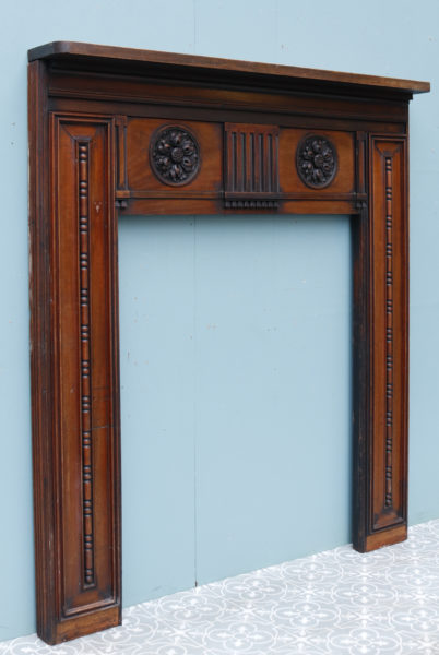 A Reclaimed Georgian Style Carved Mahogany Fireplace