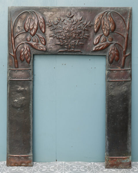 An Arts and Crafts Style Reclaimed Copper Fireplace Insert
