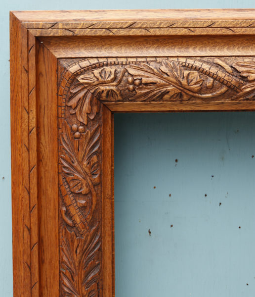 A Reclaimed Arts and Crafts Style Bolection Fire Surround