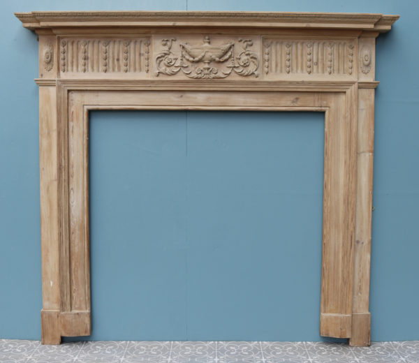 An Antique Neoclassical Style Carved Fire Surround
