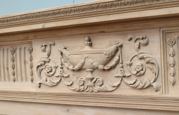 An Antique Neoclassical Style Carved Fire Surround