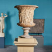 Pair of Decorative Terracotta Ionic Capitals on Stands
