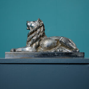 Pair of Nickel Plated Recumbent Lions