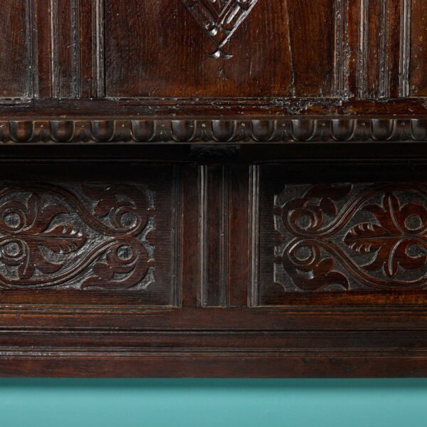 Carved Dark Oak Tudor Fireplace with Overmantel