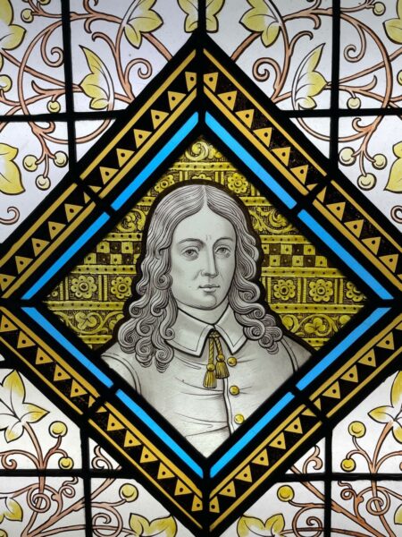 Antique Stained Glass Window Depicting a Victorian Figure