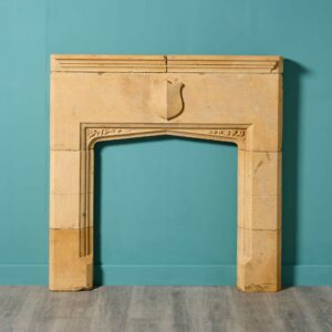 Antique Tudor Style Limestone Fireplace with Shield