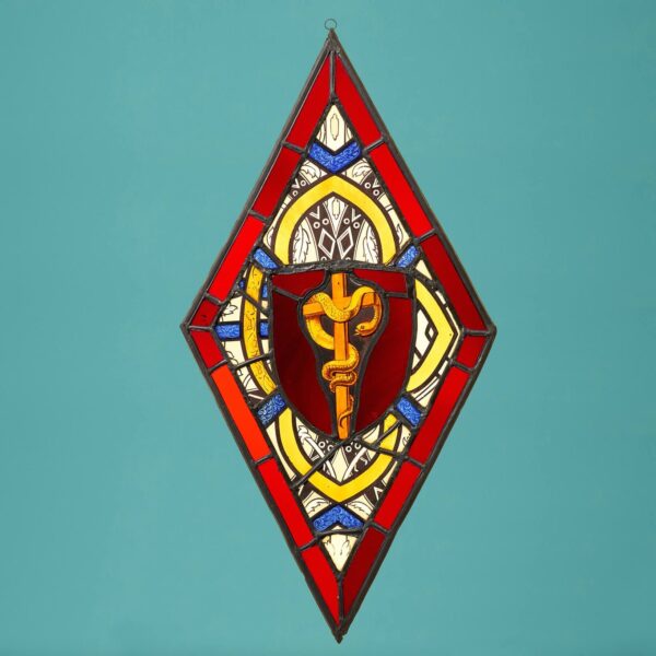 0_34242-BLUE Ecclesiastical Diamond Shaped Stained Glass Panel with Serpent