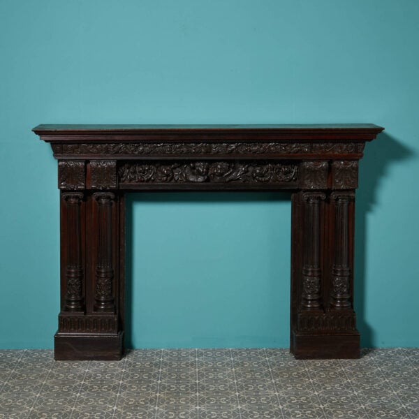 19th Century English Carved Oak Fireplace