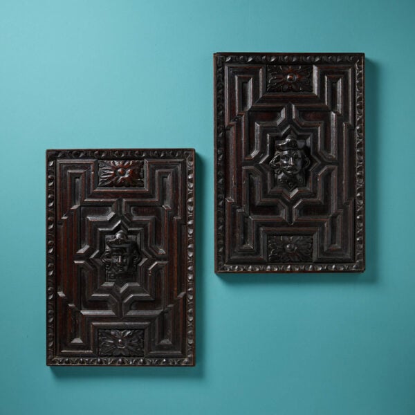 Two Antique Medieval Style Carved Oak Geometric Wall Hangings