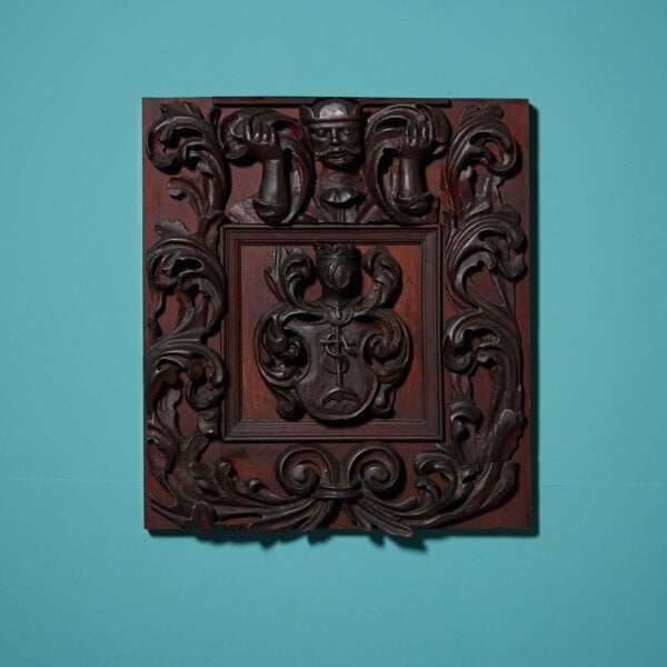 A 19th Century Continental Mahogany Armorial Wood Carving