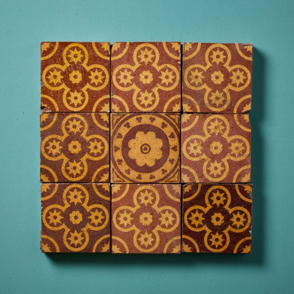 A Set of Nine Reclaimed Encaustic W.Godwin Floral Tiles