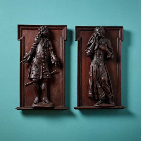Pair of 19th Century Mahogany Relief Carvings of 18th Century Figures
